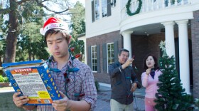 The Xia family decorates for Christmas.