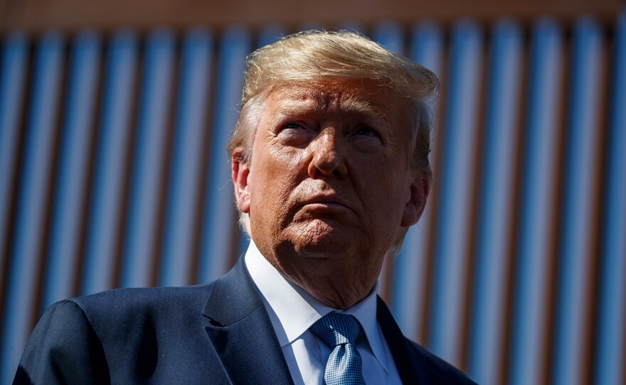 President Donald Trump tours a section of the southern border wall, Wednesday, Sept. 18, 2019, in Otay Mesa, Calif.