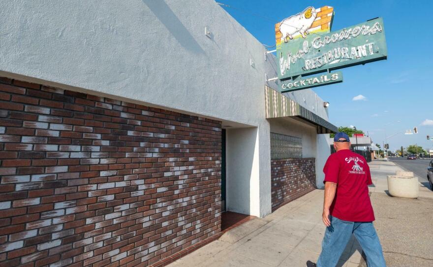 Customers arrive for the dinner service at Wool Growers, a 67-year-old Basque restaurant in House Speaker Kevin McCarthy's district. The Republican leader is facing opposition from within his own party, but back home, some constituents are praising his performance under tough circumstances.
