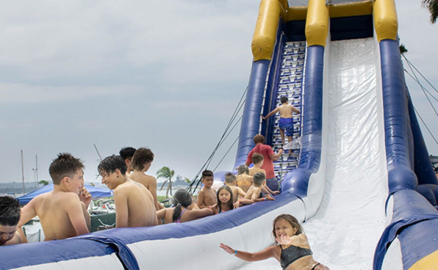 families enjoying recreation along Mission Bay