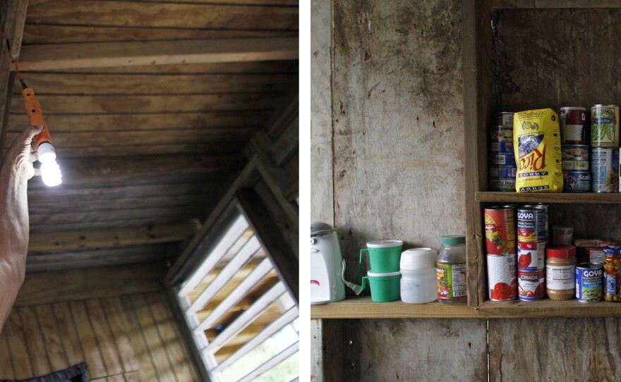 (Left) José Ramón Sierra Meléndez, turns on a light bulb inside their recently repaired house. (Right) Felicita and José store canned food in their home.