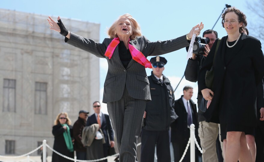 Edith Windsor greets her supporters as she leaves the Supreme Court in 2013, just months before the court would rule in her favor, striking down the Defense of Marriage Act.