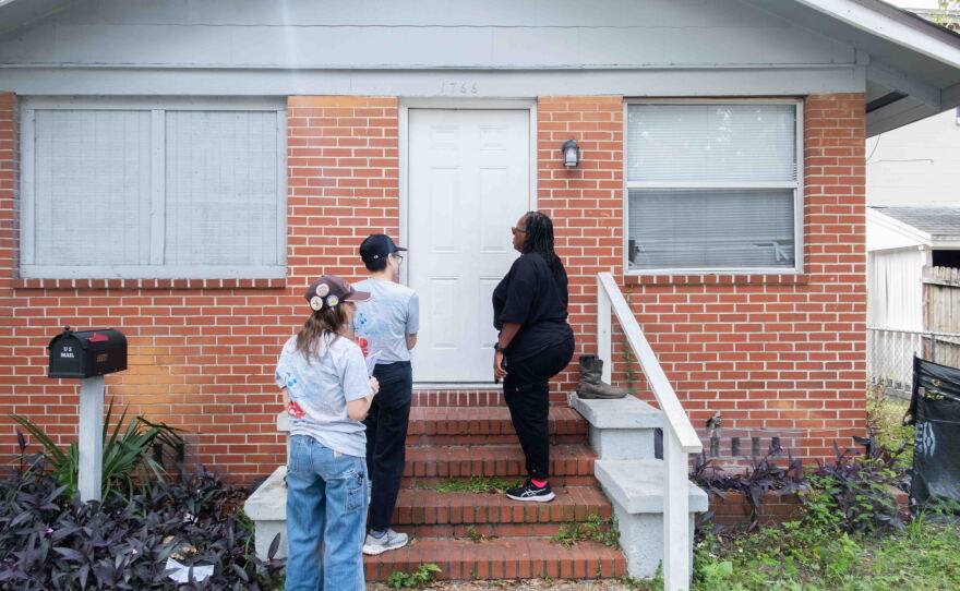 Volunteers with Florida Rising, a progressive nonprofit that organizes residents to take political action on state and local issues, knock on doors in Jacksonville, Fla., to encourage residents to vote no on an amendment that would cut property taxes.