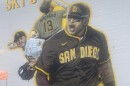 A mural of Padres third baseman Manny Machado on the side of the old Vogue Theater in Chula Vista, California. The mural was created by Ground Floor Murals. (Dec. 13, 2021)