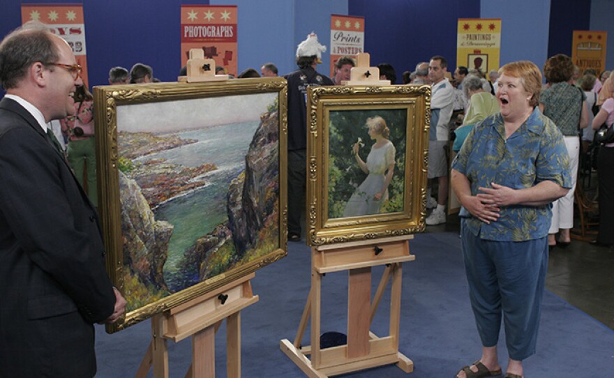 Alan Fausel (left) appraises Early 20th C. Yates & Curran oils in Los Angeles.