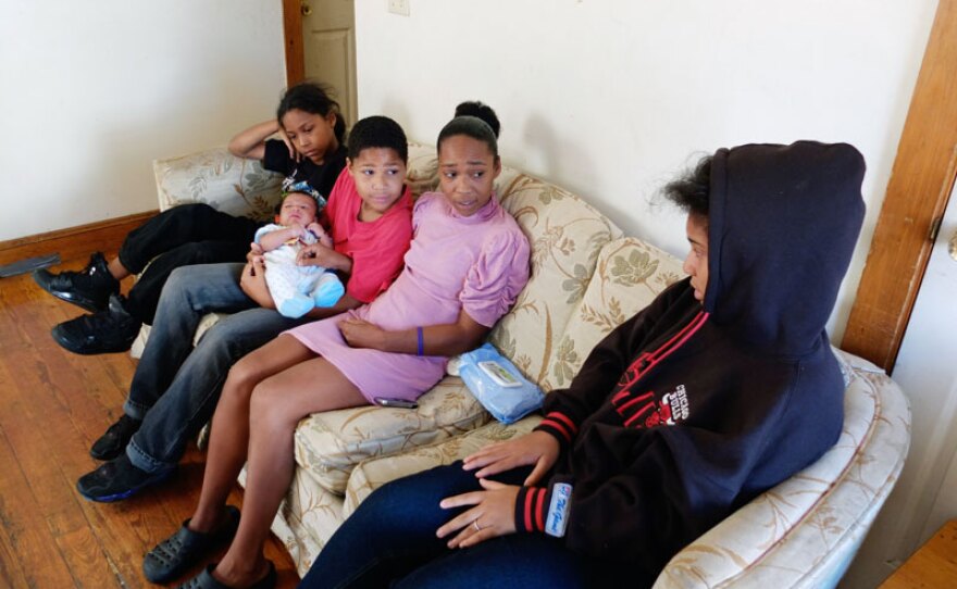 Fior Vasquez supports her three children as well as her sixteen year-old daughter’s new baby on her part time wages at a McDonalds restaurant in Central Falls, RI.