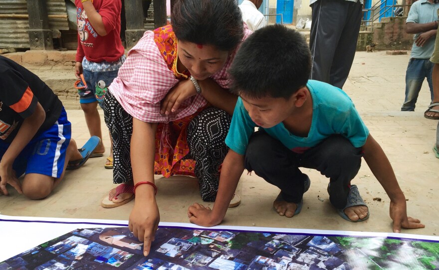 In Nepal, Meier printed out banners showing high-resolution maps from stitched-together drone images. People in Panga, near Kathmandu, had the opportunity to annotate the maps with additional information and fill in blank spots.