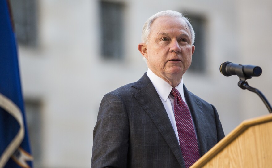 Attorney General Jeff Sessions speaks during a vigil ceremony marking the Sept. 11 terrorist attacks at the Department of Justice.