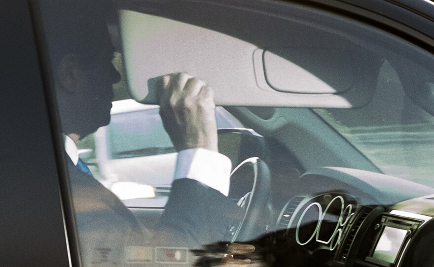 Former Trump Campaign Chairman Paul Manafort, seen here leaving his home in Alexandria, Va., early Monday, was reportedly told to report to an FBI field office.