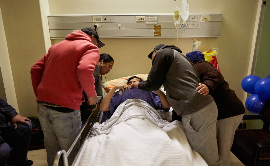 After her gender-affirming surgeries, Chedino shows off her new breasts to Keagan, his mother and a few of her friends.