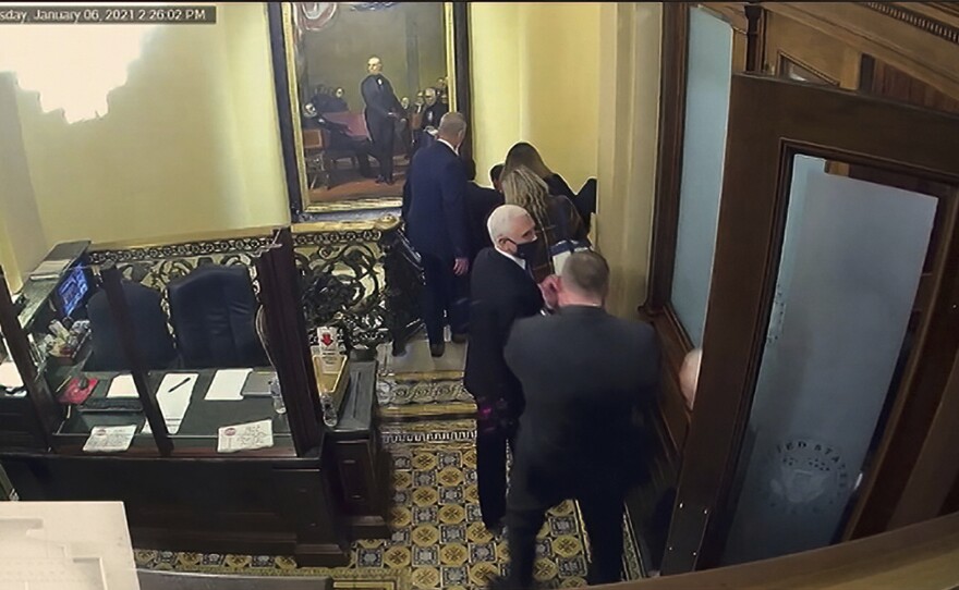 A security video shows then-Vice President Mike Pence being evacuated as rioters breach the Capitol on Jan. 6.