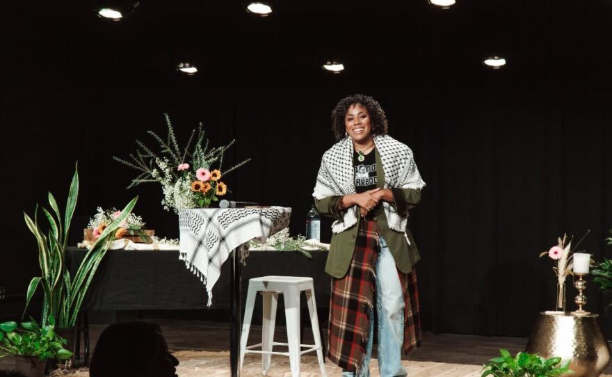 Brisa Johnson, director of the San Diego Black Worker Center, is seen on stage in this undated photo.