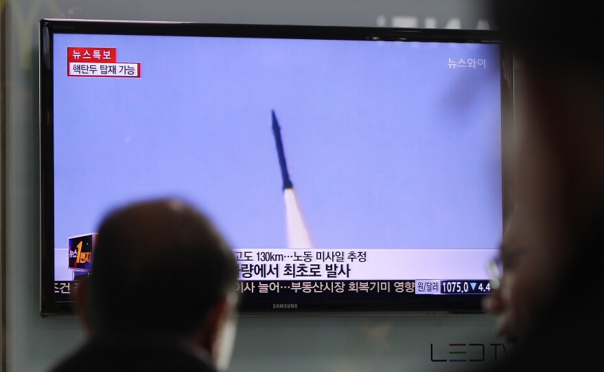 People watch a television broadcast reporting the North Korean missile launch at the Seoul Railway Station on March 26 in Seoul, South Korea. "Super forecasters" are reportedly 30 percent more accurate than CIA analysts.