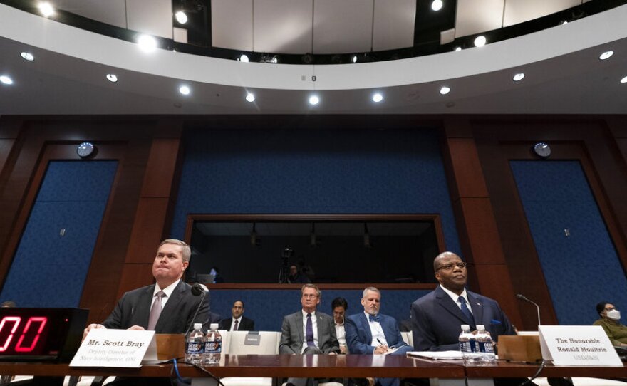 Deputy Director of Naval Intelligence Scott Bray, left, and Under Secretary of Defense for Intelligence and Security Ronald Moultrie speak Tuesday during a House Intelligence, Counterterrorism, Counterintelligence, and Counterproliferation Subcommittee hearing on "Unidentified Aerial Phenomena" on Capitol Hill in Washington.