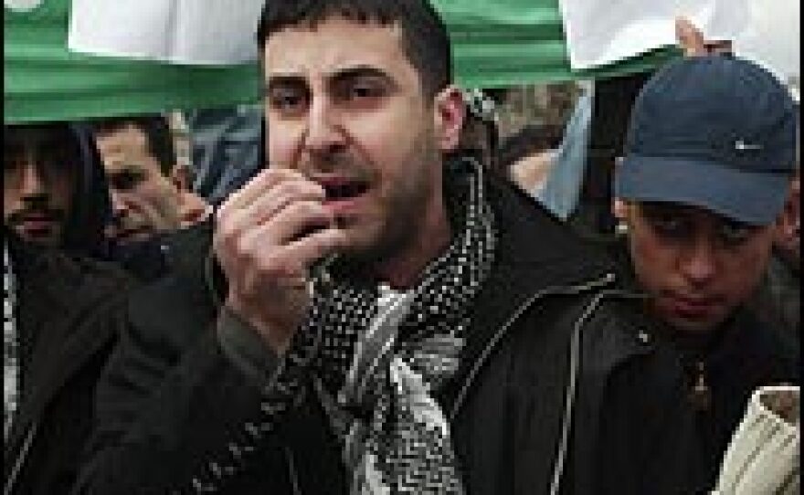 Dyab Abou Jahjah of the Arab European League justifies Muslim immigrants resorting to violent protest when they feel oppressed. In this 2004 photo, he is seen protesting the killing of Hamas spiritual leader Sheikh Ahmed Yassin.