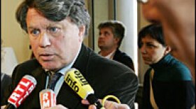 Gilbert Collard, lawyer for Zoe's Ark, talks to the media after six people associated with the French charity were charged with kidnapping.