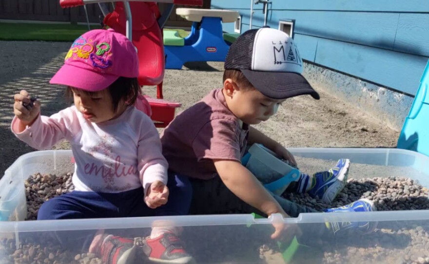 Miles and Emilia Lum play in the backyard at home in San Diego in this undated photo.