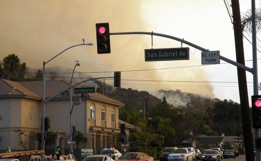 Smoke from the Colby Fire encroaches on a Glendora neighborhood in this undated photo.