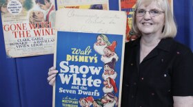 At ANTIQUES ROADSHOW in Des Moines, this guest shows off a number of beautifully preserved movie window cards from the 1920s though the 1950s, including this original card used for the 1937 release of “Snow White and the Seven Dwarfs.” This impressive collection from Hollywood’s Golden Age is valued at $25,000 to $28,000.