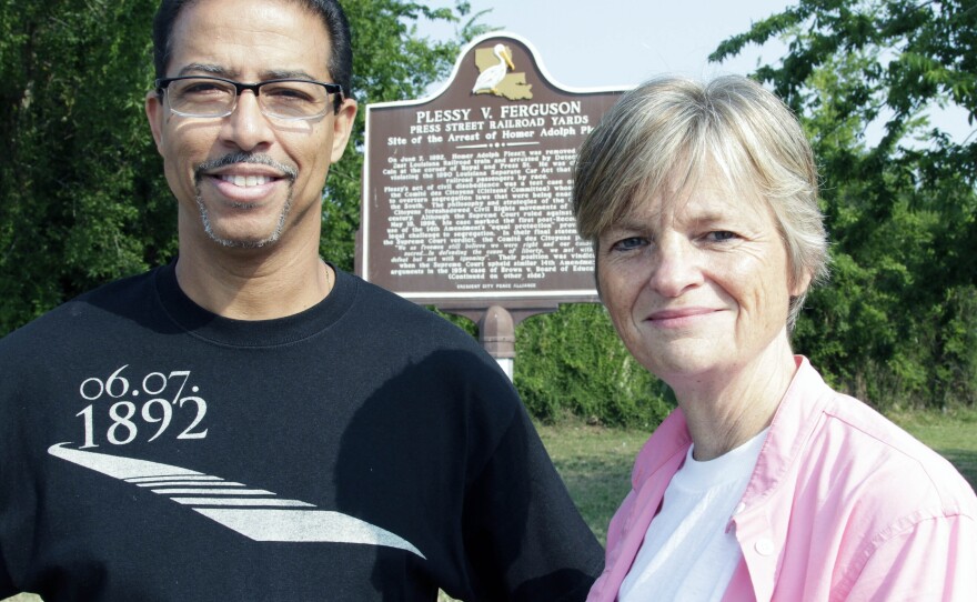 Keith Plessy and Phoebe Ferguson, descendants of the principals in the Plessy V. Ferguson court case, pose for a photograph in front of a historical marker in New Orleans, on Tuesday, June 7, 2011. Homer Plessy, the namesake of the U.S. Supreme Court's 1896 "separate but equal" ruling, was granted a posthumous pardon, Wednesday, Jan. 5, 2022.