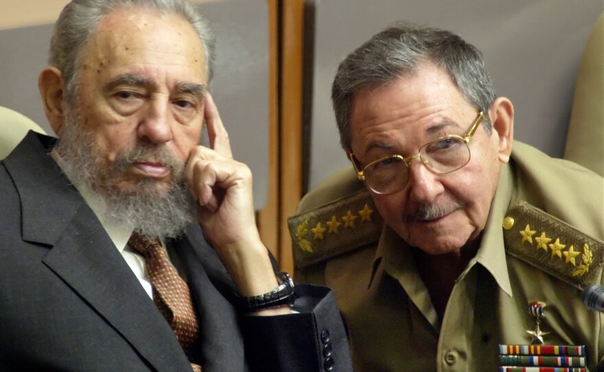 Castro and his brother, Minister of Defense Raul Castro, attend a Cuban Parliament session on July 1, 2004, in Havana. In 2006, Fidel Castro ceded power to his brother due to poor health.