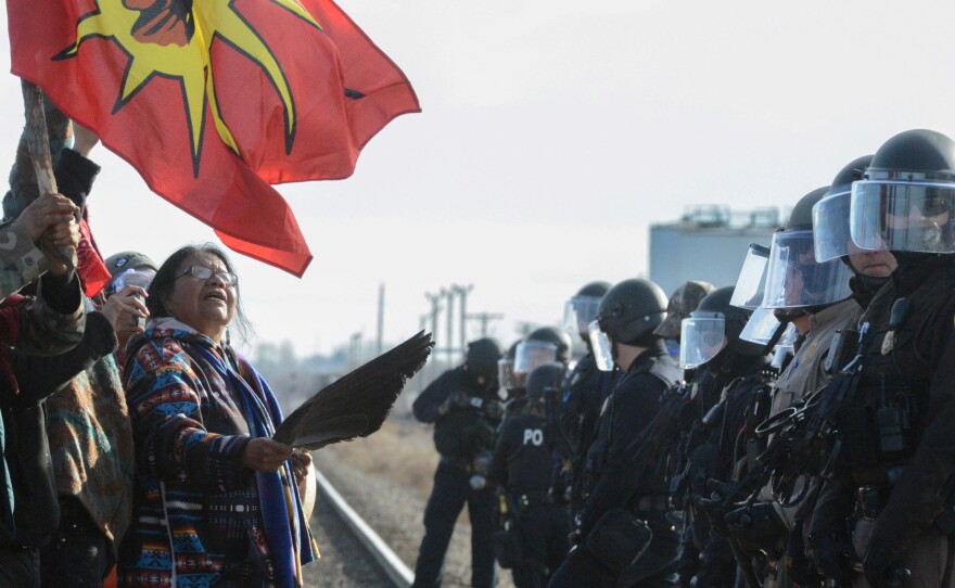 Protesters have a standoff with police during a demonstration against the Dakota Access pipeline near the Standing Rock Indian Reservation in Mandan, N.D., on Nov. 15.