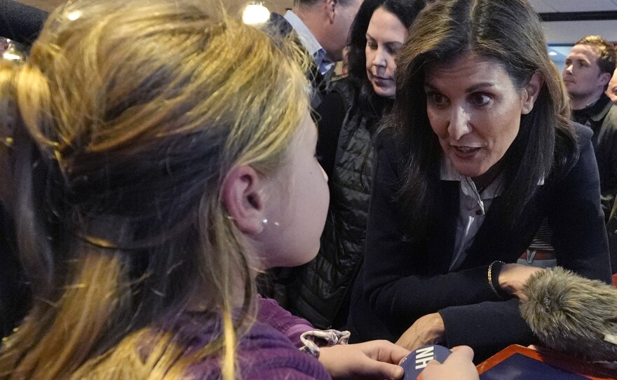 Republican presidential candidate former UN Ambassador Nikki Haley chats with 10-year-old Hadley Craig during a campaign stop on Jan. 19 in Milford, N.H.
