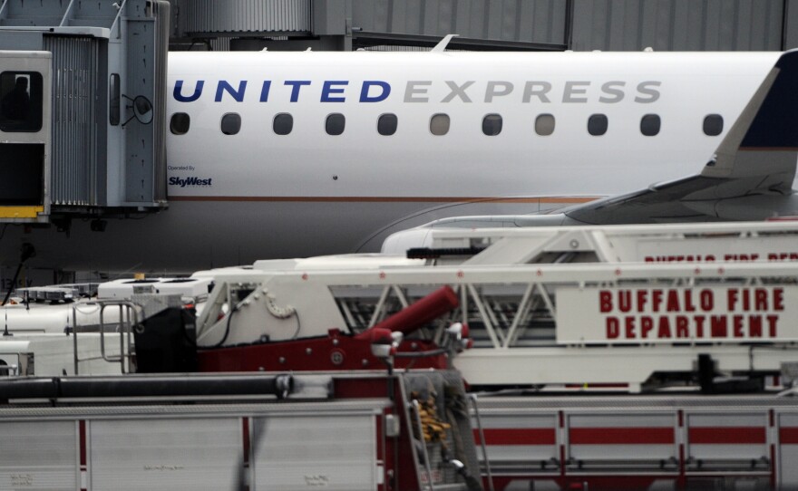 SkyWest Airlines says three passengers lost consciousness on a plane, operating as United Express, that made an emergency landing in Buffalo on Wednesday.