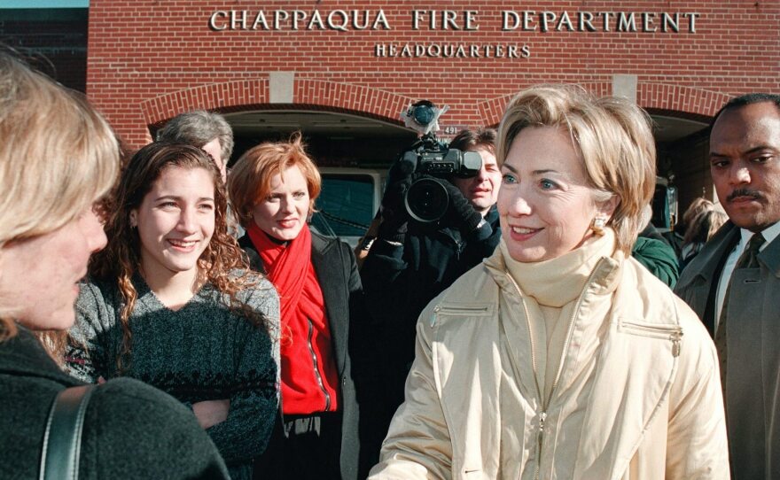 Local residents greet Clinton in front of the Chappaqua Fire Department in 2000.