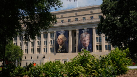 Banners of former President George Washington and President Donald Trump hang above an entrance to the Department of the Interior, Thursday, June 25, 2026, in Washington.