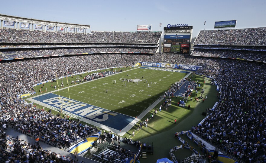 The San Diego Chargers play against the Oakland Raiders during the first half of an NFL football game at Qualcomm Stadium in San Diego, Nov. 16, 2014.