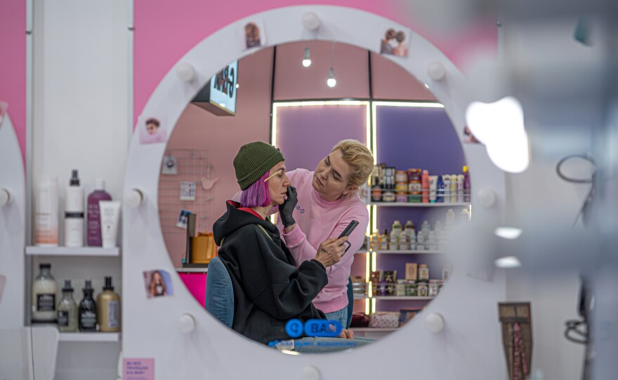 Combat medic Olena Ivanenko at a beauty salon during a day off from the front line earlier this year.