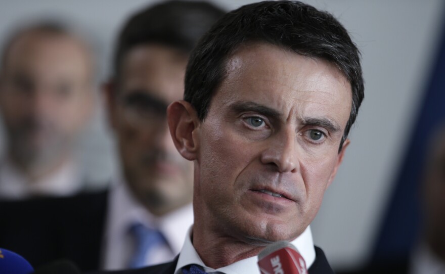 French Prime Minister Manuel Valls speaks to the media Tuesday at the Air France headquarters in Roissy-en-France.
