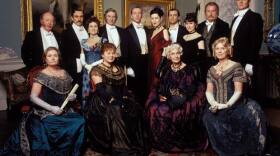 The cast starting on back row: Swithin (Robert Lang), Montague Dartie (Ben Miles), Winifred (Amanda Root), James Forsyte (John Carlisle), Soames (Damian Lewis), Irene (Gina Mckee), Young Jolyon (Rupert Graves), June (Gillian Kearney), Old Jolyon (Corin Redgrave), George (Alistair Petrie). Front row: Aunt Hester (Ann Bell), Emily Forsyte (Barbara Flynn), Aunt Ann (Judy Campbell) And Aunt Juley (Wendy Craig).