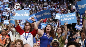 Delegates cheer as former Democratic presidential candidate Vermont Sen. Bernie Sanders speaks during the first day of the Democratic National Convention in Philadelphia, July 25, 2016. 
