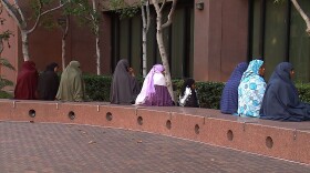 Supporters of three men accused of supporting Somali terrorists, gather outside of a federal courthouse before a bail hearing on November 9, 2010.