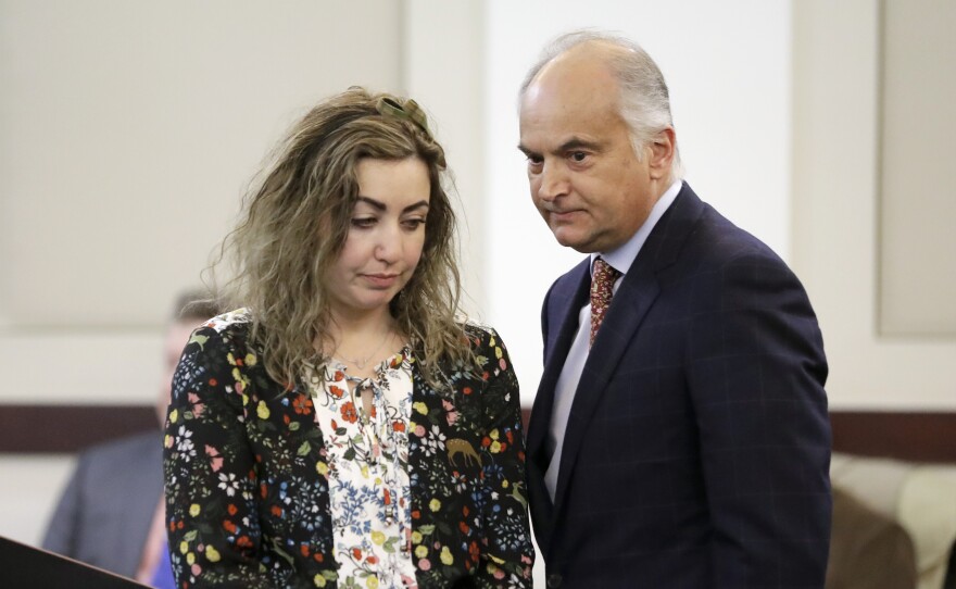 RaDonda Vaught appears at a court hearing with her attorney, Peter Strianse, in February. Vaught, a former nurse at Vanderbilt University Medical Center, was charged with reckless homicide after a medication error killed a patient.