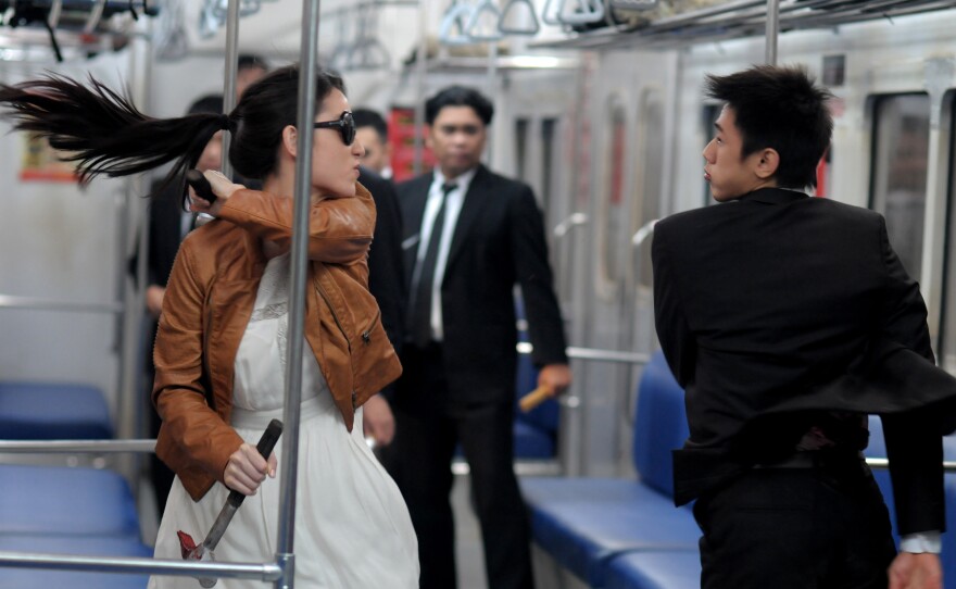 A subway fight is one of the action highlights in "The Raid 2."