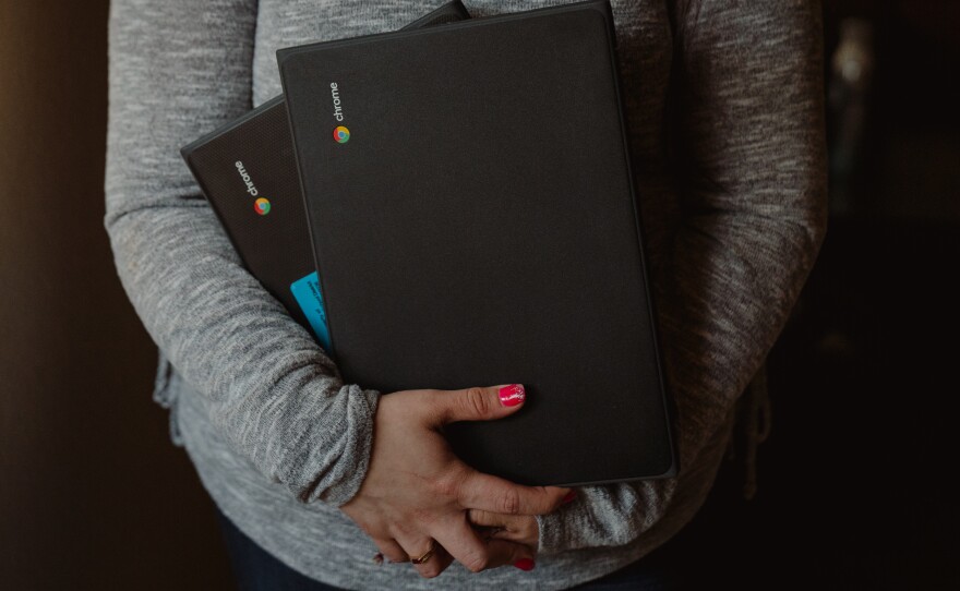 Patricia Lopez, a mother of two, enrolled in community college after losing her job at the start of the pandemic. Because she did not have a computer, the school gave her one. Her daughter, Yamely, also received a Chromebook from school.