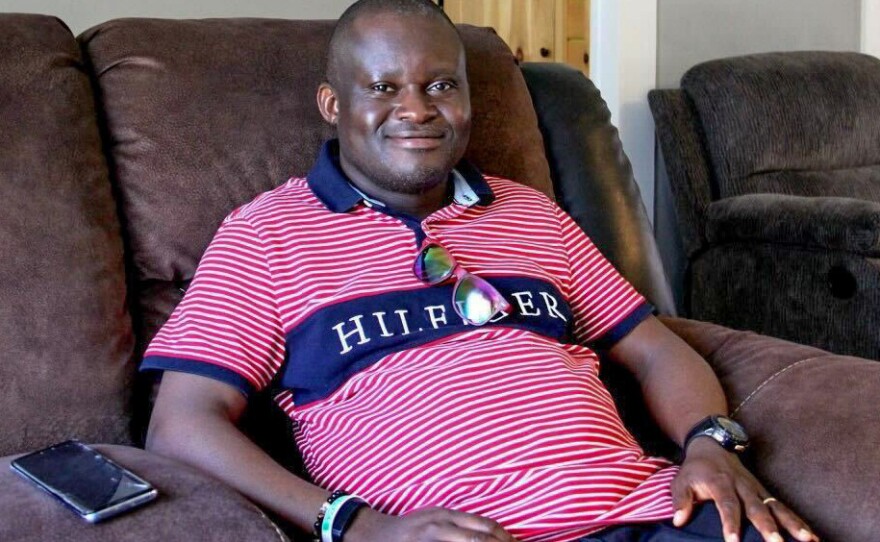 The city of Burlington pays outreach workers like Jules Wetchi, an immigrant from the Democratic Republic of Congo, to connect with immigrants on noncitizen voting.