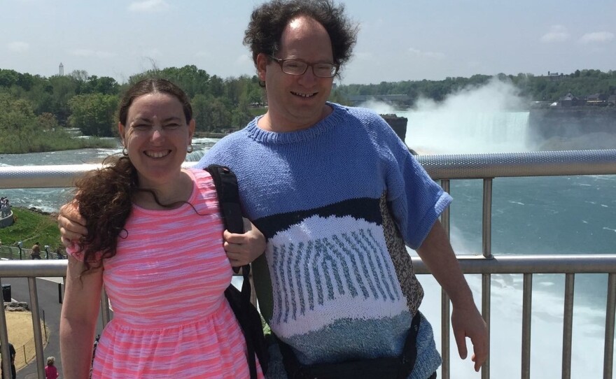 In his Niagara Falls sweater, Barsky visits the tourist site with his wife, Deborah.