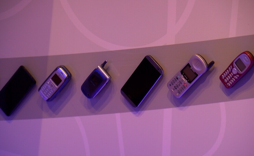 Mounted on a wall is part of a history of mobile phone technology at Qualcomm headquarters. Apr 12, 2023