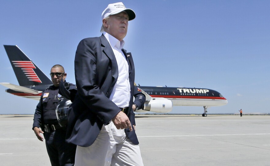Republican presidential hopeful Donald Trump in front of his campaign plane in Laredo, Texas last week.