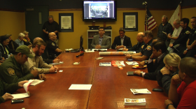 San Diego Councilman David Alvarez talks to emergency officials and Tijuana River Valley residents about evacuation plans in preparation for potential El Niño flooding, at the Southern Division San Diego Police Department, Jan. 5, 2016.