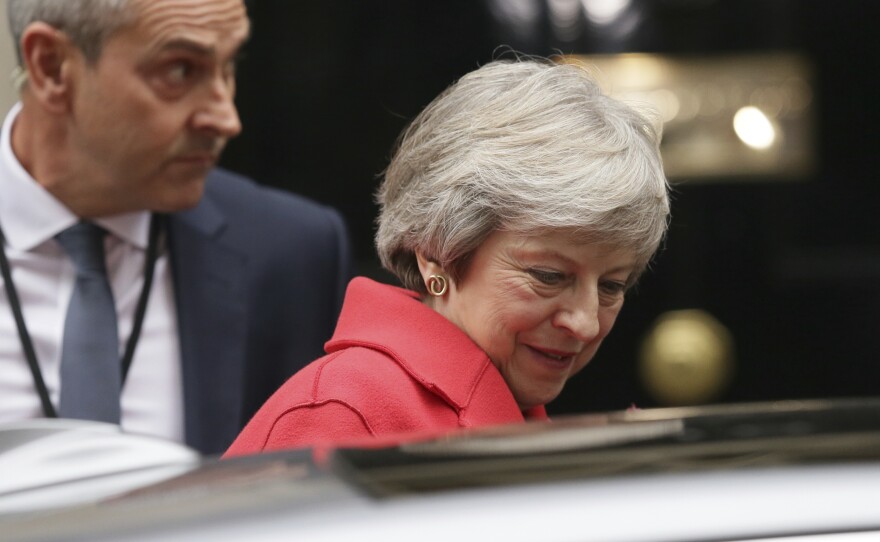 British Prime Minister Theresa May leaves No. 10 Downing St. for the Houses of Parliament on Thursday. Her speech there defending the tentative Brexit deal did little to calm critics — either among her political rivals or within her own party.