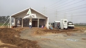 The Yes on A tent being dismantled in Carlsbad, March 1, 2016.