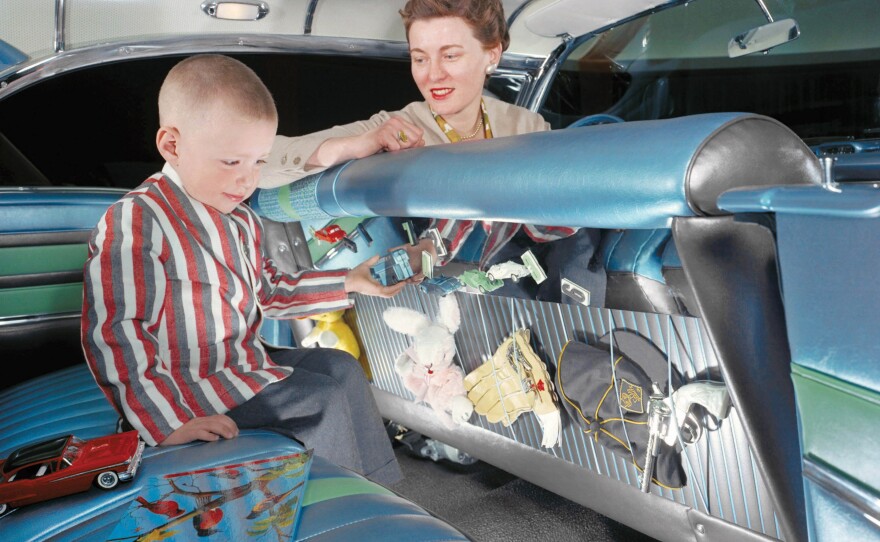 Peggy Sauer was one of the "Damsels in Design" at GM hired to work on car interiors. She's shown here with her design for the backseat of a 1958 Oldsmobile.