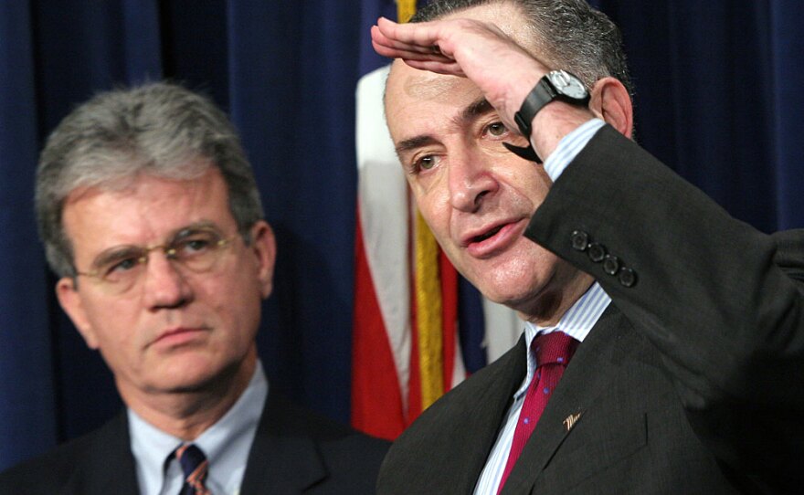 New York Democrat Chuck Schumer (right) and Oklahoma Republican Tom Coburn (left) plan to sit together. "We hope many others will follow us," Schumer said. "Now, that's symbolic, but maybe it just sets a tone and everything gets a little bit more civil."