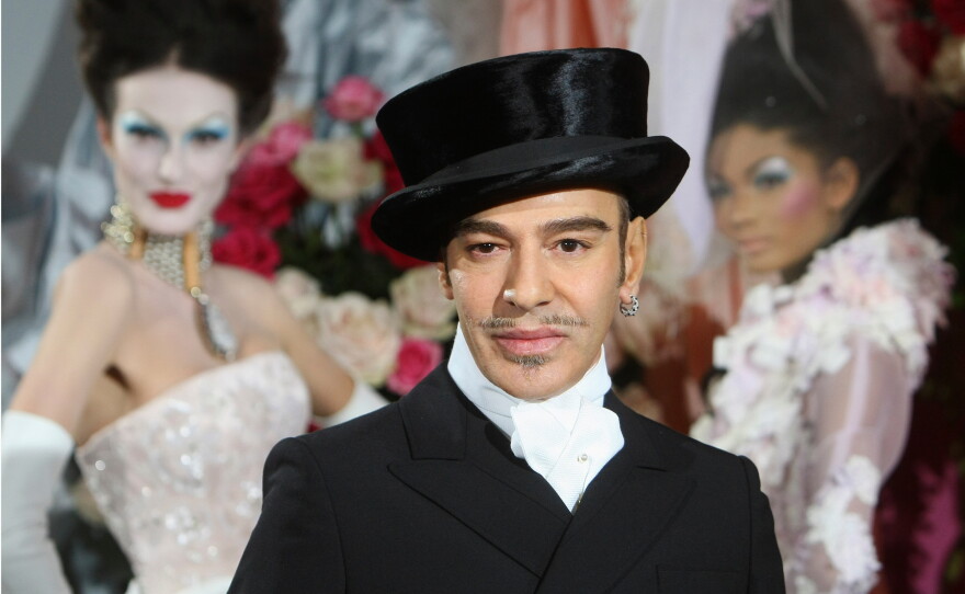 FILE - Fashion designer John Galliano poses at the end of the presentation of the Dior Haute Couture spring/summer 2010 fashion collection on Jan. 25, 2010, in Paris.