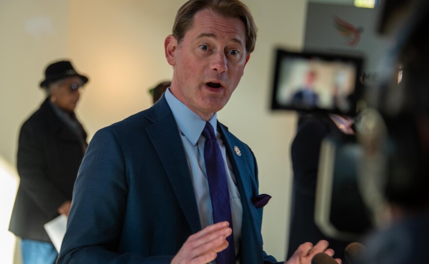 Kentucky Secretary of State Michael Adams speaks with reporters after voting early in Louisville on Thursday. Adams, a Republican, is running for reelection.